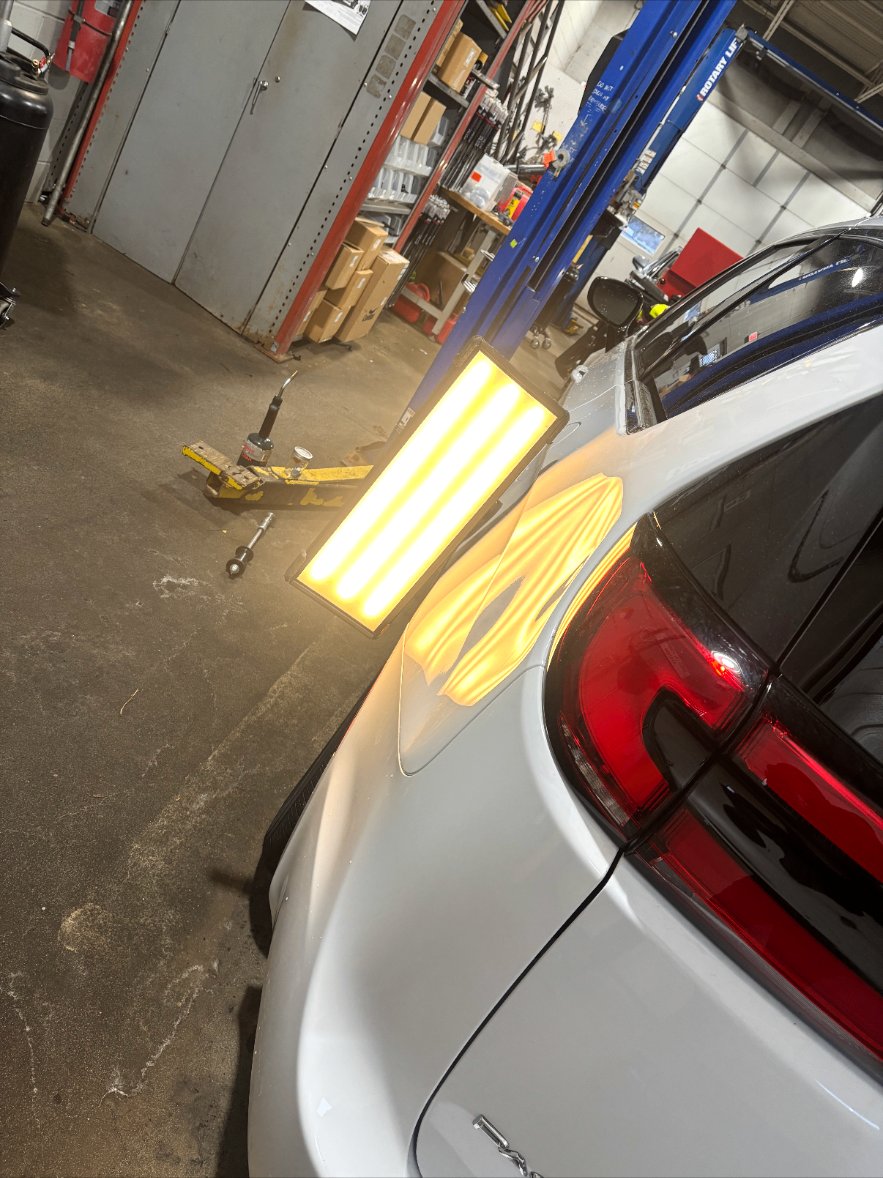 Left quarter panel — minivan before repair