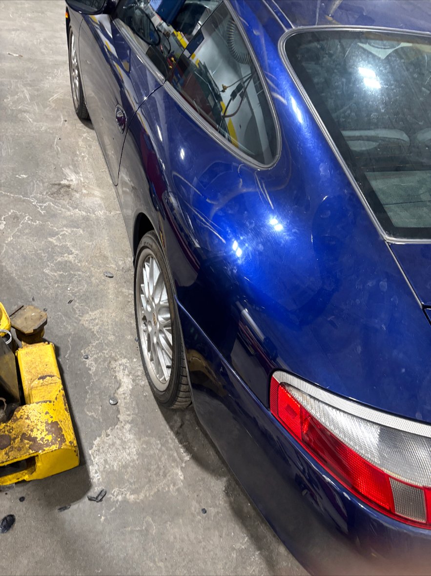 Left quarter panel — Porsche after repair